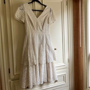 Midi lace dress with open bow back